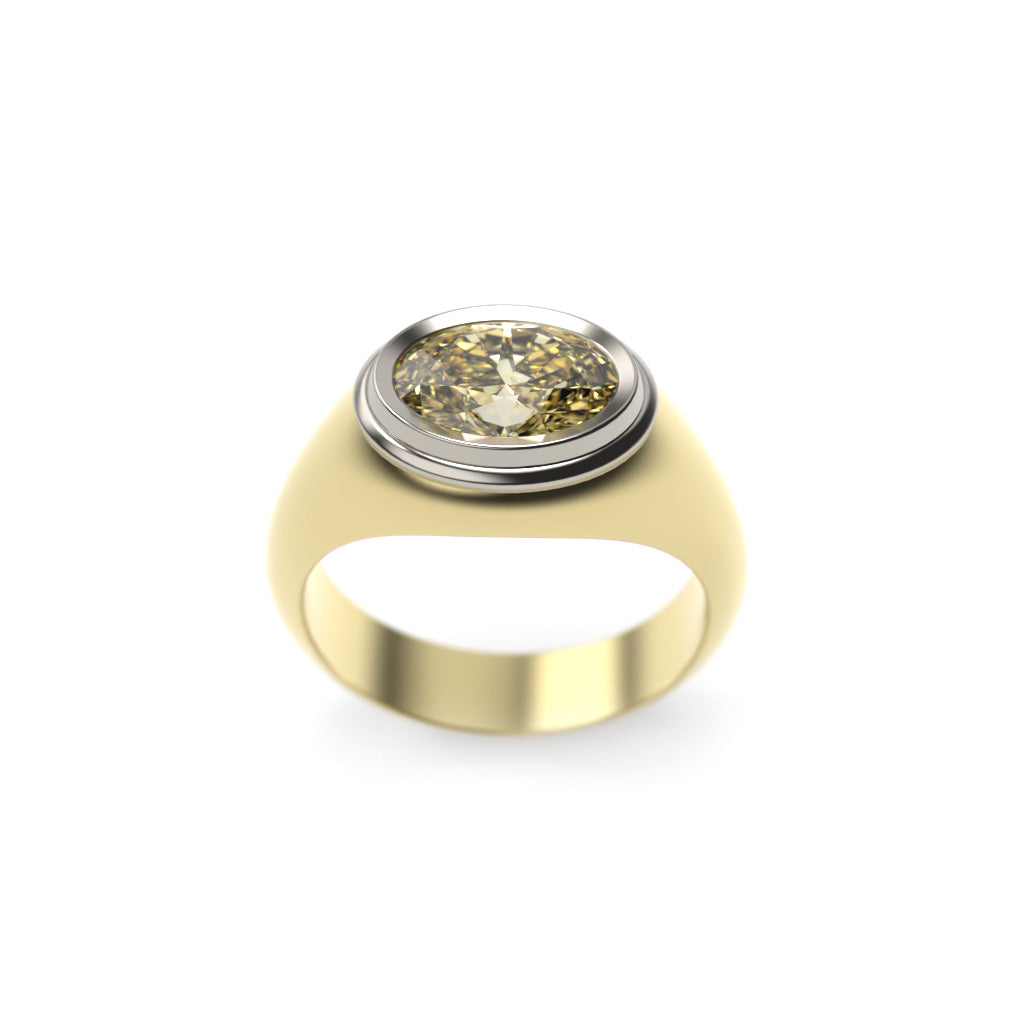 Low front view of a two-tone yellow diamond signet ring showing the raised bezel