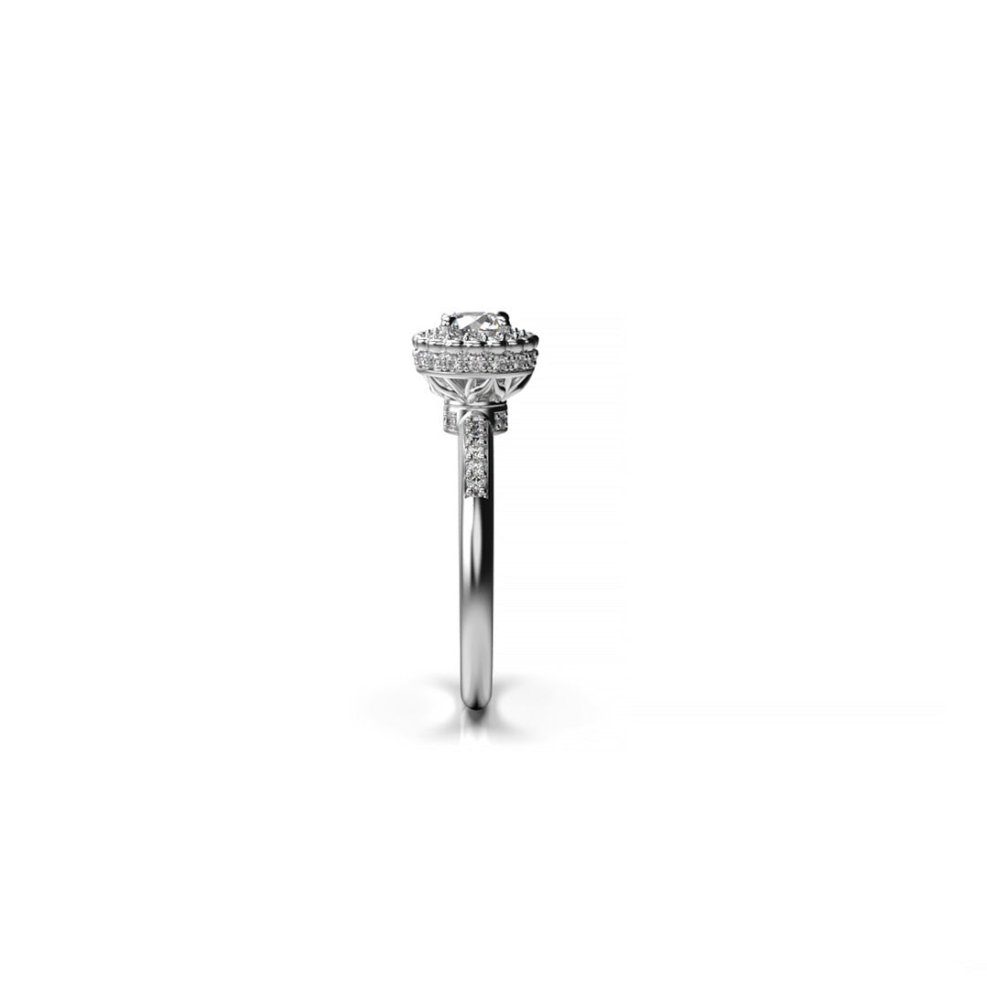 White gold floral halo diamond ring with pavé band, crafted with brilliant-cut center stone  side view