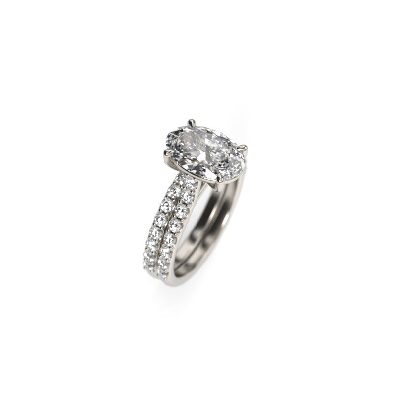 Oval-Cut Diamond Engagement Ring and Matching Wedding Band