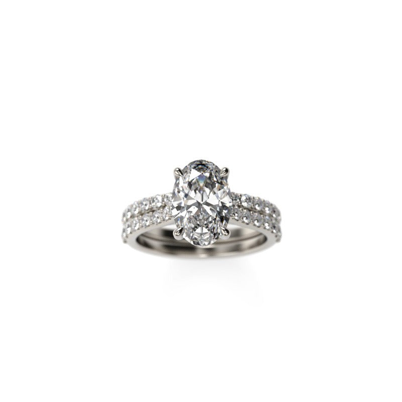 Oval-Cut Diamond Engagement Ring and Matching Wedding Band