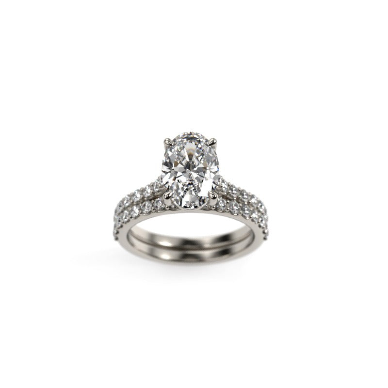Oval-Cut Diamond Engagement Ring and Matching Wedding Band