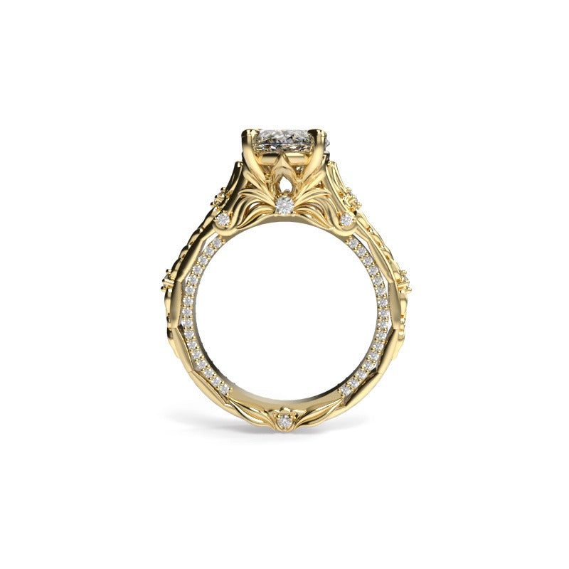Side view of a yellow gold floral marquise engagement ring with sculpted leaves beneath the centre diamond.