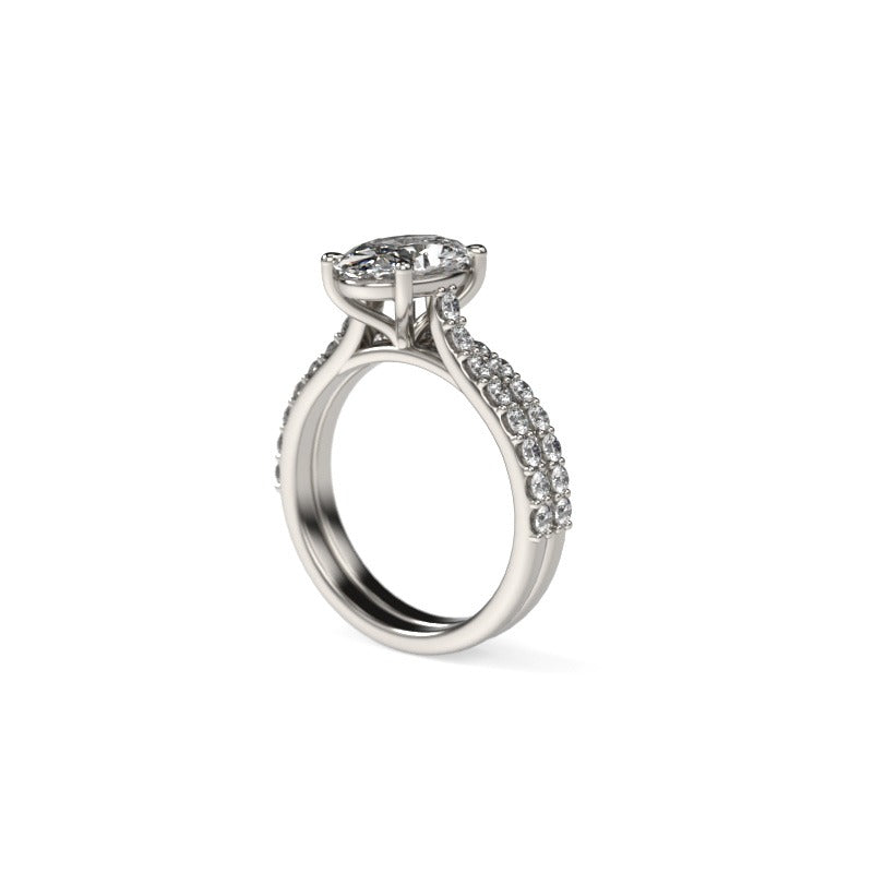 Oval-Cut Diamond Engagement Ring and Matching Wedding Band